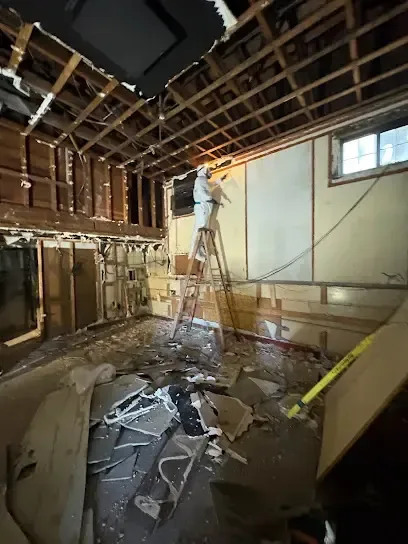 Drying equipment in an apartment after a ceiling leak from the unit above